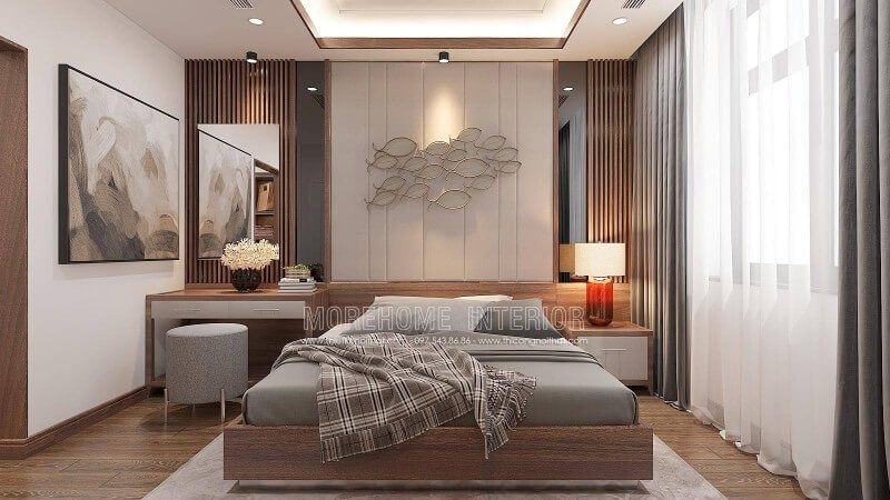 Mẫu thiết kế nội thất phòng ngủ nam tính sử dụng giường ngủ gỗ óc chó veneer hiện đại liền mạch với tấm gỗ ốp tường hiện đại, được thiết kế chiếm toàn bộ phần diện tích mảng tường dưới vừa đẹp vừa thuận tiện cho việc vệ sinh đặc biệt là phòng từ cậu con trai.