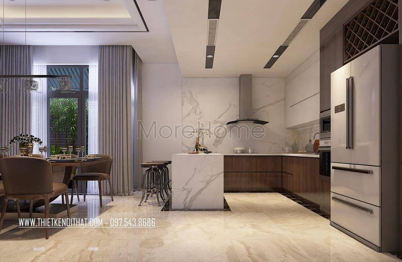 Trần thạch cao phòng bếp được thiết kế phẳng với đèn âm tường mang lại ánh sáng ấm cúng cho phòng bếp